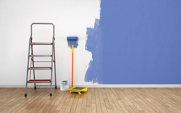 painting walls of an empty room. renovation house.